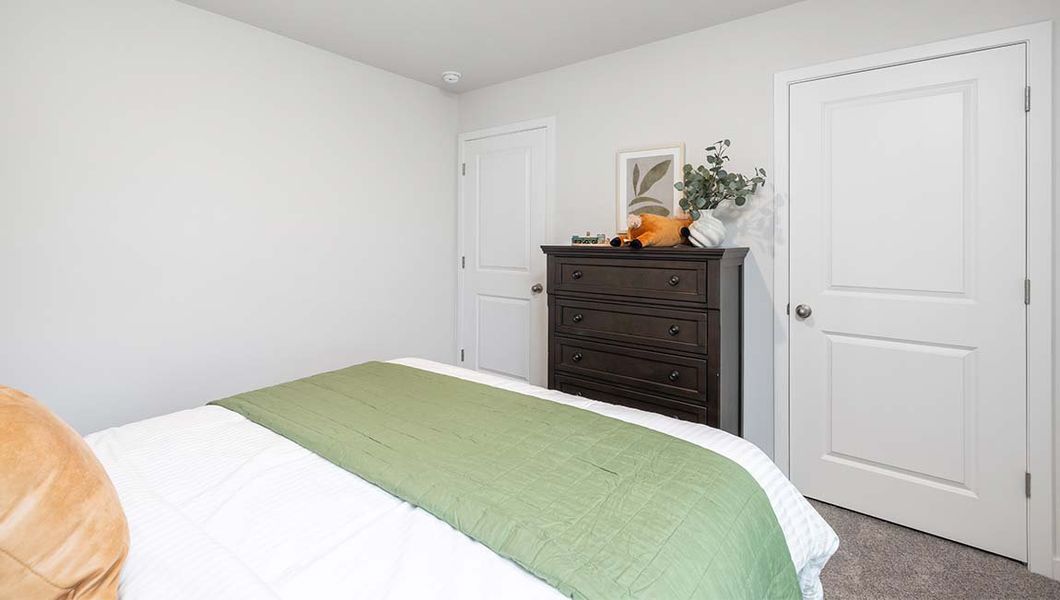 Furnished interior in a model home at Cardinal Creek in Charlotte (Image 27).