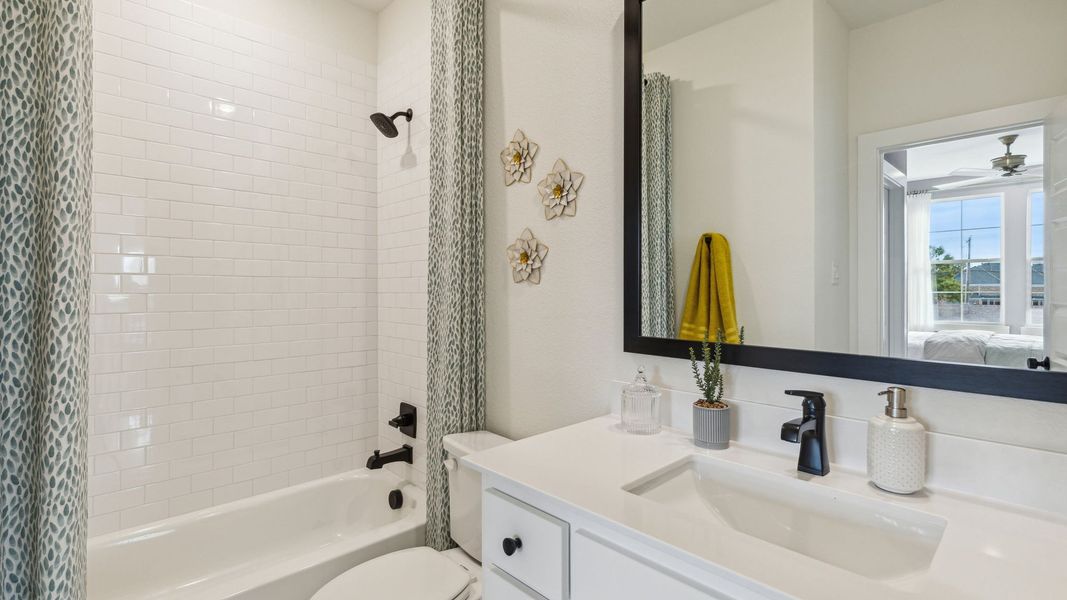 Furnished interior in a model home at The Reserve at Watters in Allen (Image 36).