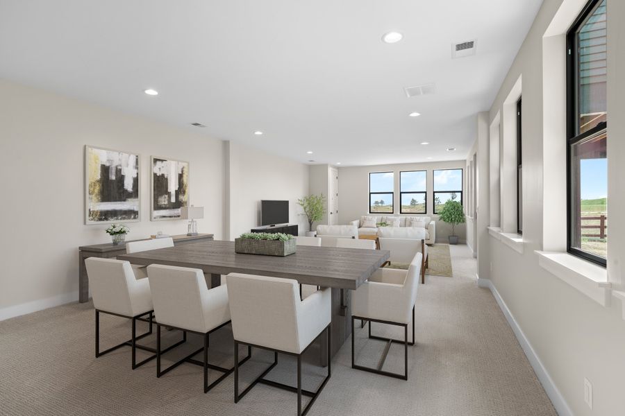 Furnished interior in a model home at The Fairways at RainDance in Windsor (Image 12).