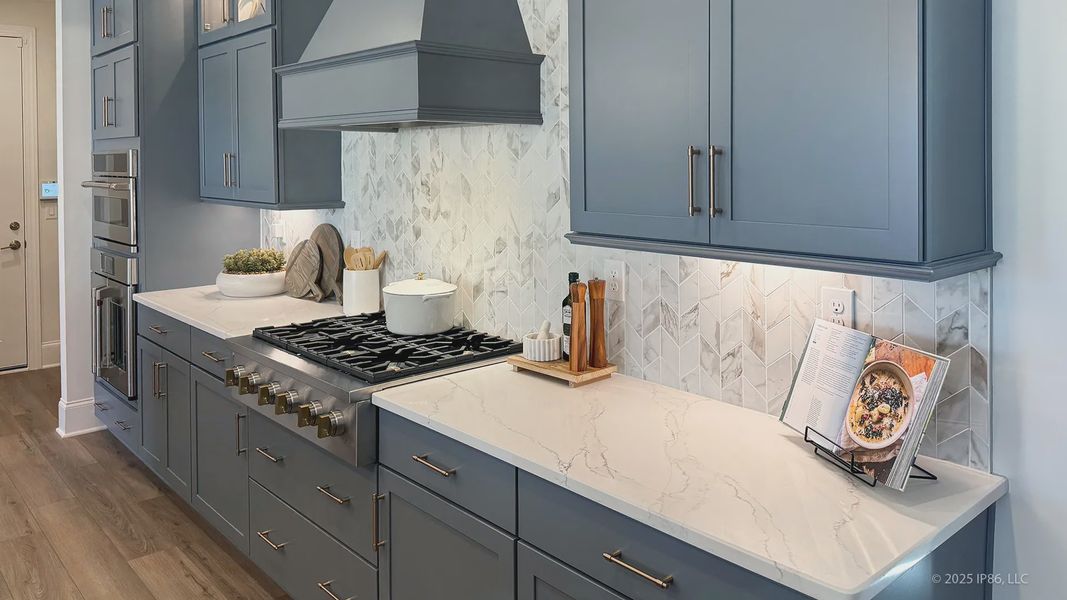 Furnished interior in a model home at The Courtyards at Lake Davidson in Mooresville (Image 7).