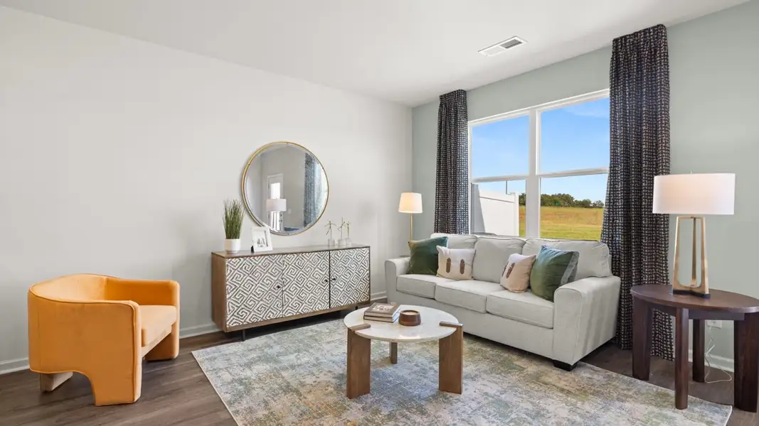 Furnished interior in a model home at The Gables at Agricultural Village in Perry (Image 3).