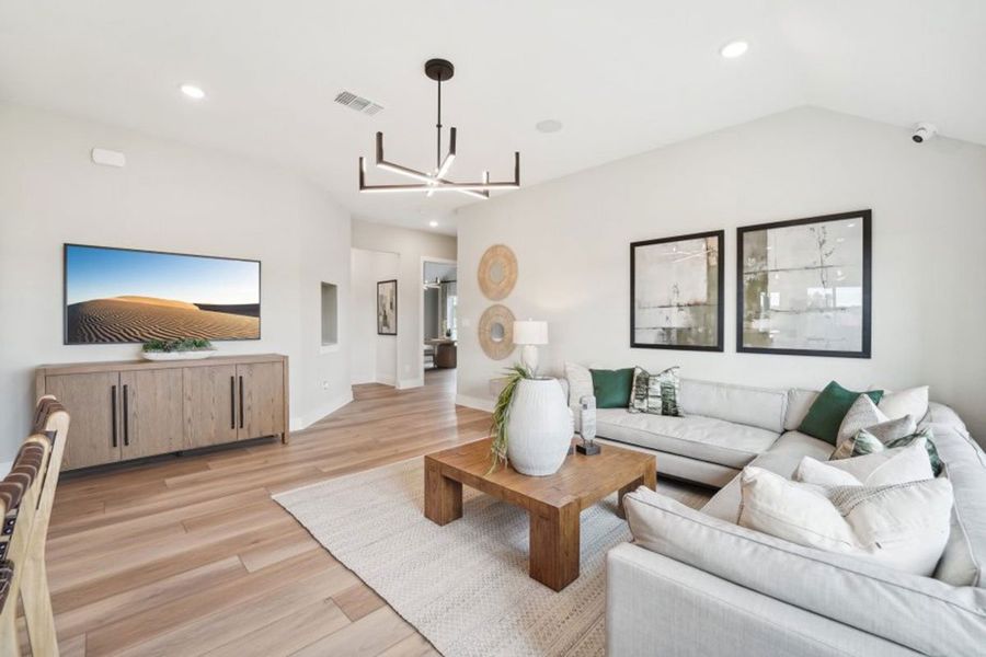 Furnished interior in a model home at Grande Estates in Bertram (Image 24).