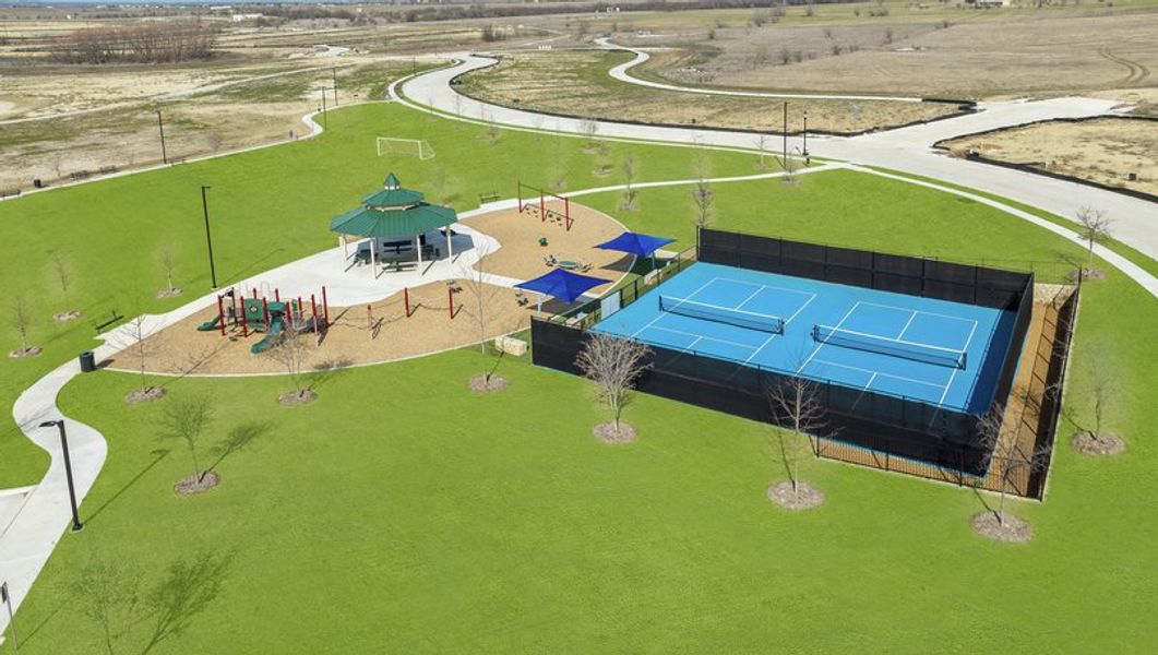 The pickleball courts sit adjacent to the park, gazebo and soccer field.