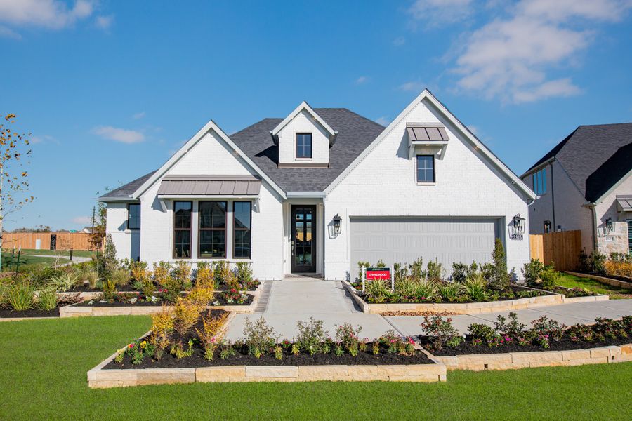 Front exterior of a home in the Ellwood: Heritage Collection community, located in Iowa Colony, TX (Image 11).