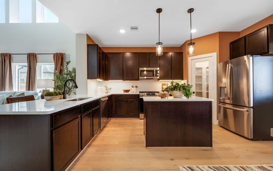 Furnished interior in a model home at Harvest Pointe in Needville (Image 15).