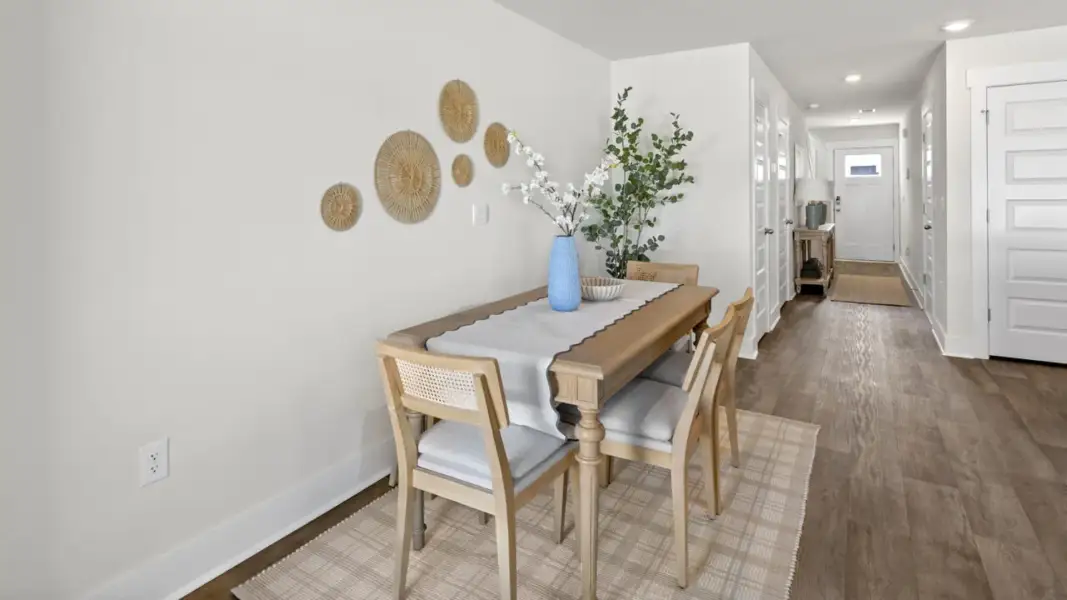 Furnished interior in a model home at The Cove at Indigo Preserve Townhomes in Leland (Image 27).