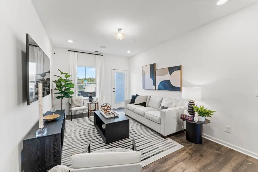Furnished interior in a model home at Meadowview TH in Pittsboro (Image 3).