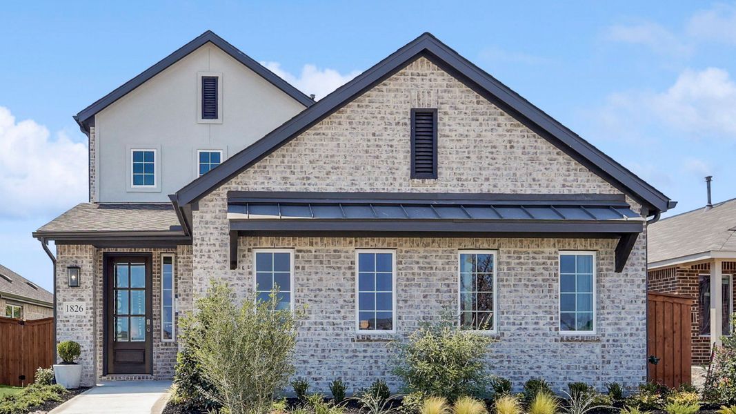 Front exterior of a home in the Prominence community, located in San Antonio, TX (Image 4).