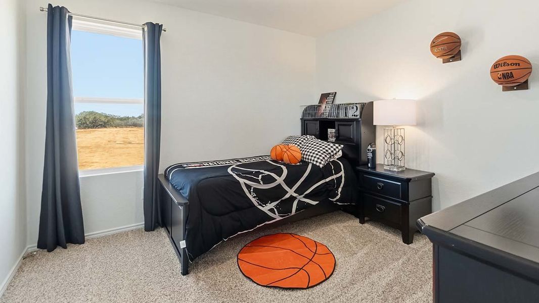 Furnished interior in a model home at Hickory Ridge in Elmendorf (Image 29).
