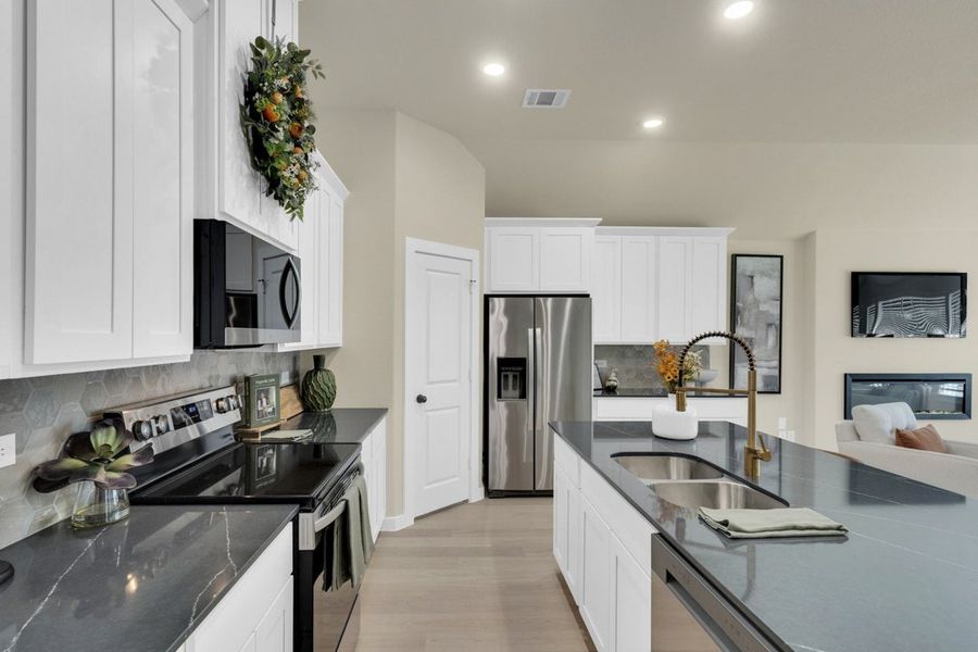 Furnished interior in a model home at South Meadow in Melissa (Image 25).