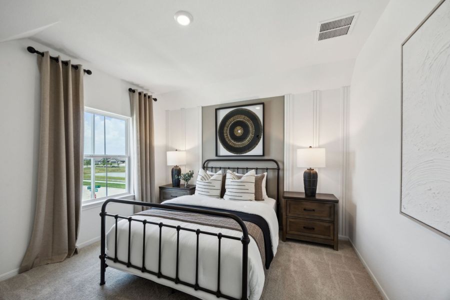 Furnished interior in a model home at Windcress in Cove (Image 17).