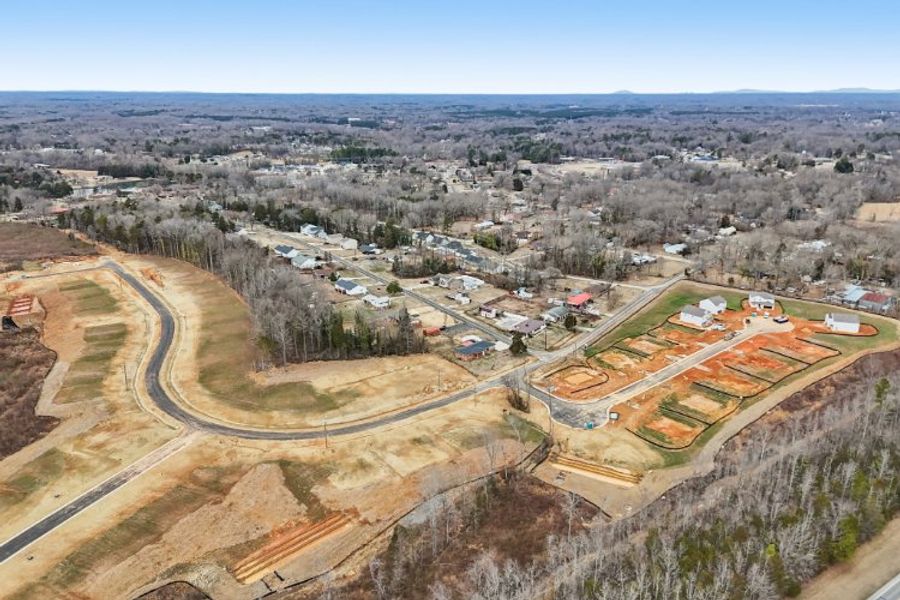 A landscape with houses and trees. A landscape with houses and trees.