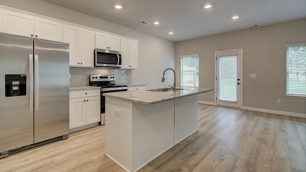 Furnished interior in a model home at Anatole in Atlanta (Image 3).