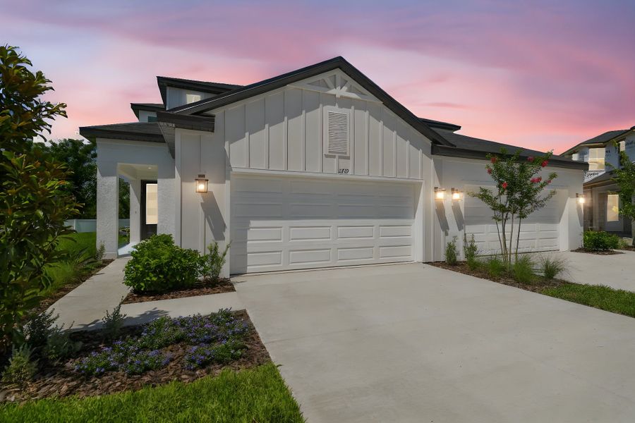 Front exterior of a home in the Fairway Pointe - Villa Community community, located in Sun City Center, FL (Image 15). Front exterior of a home in the Fairway Pointe - Villa Community community, located in Sun City Center, FL (Image 15).