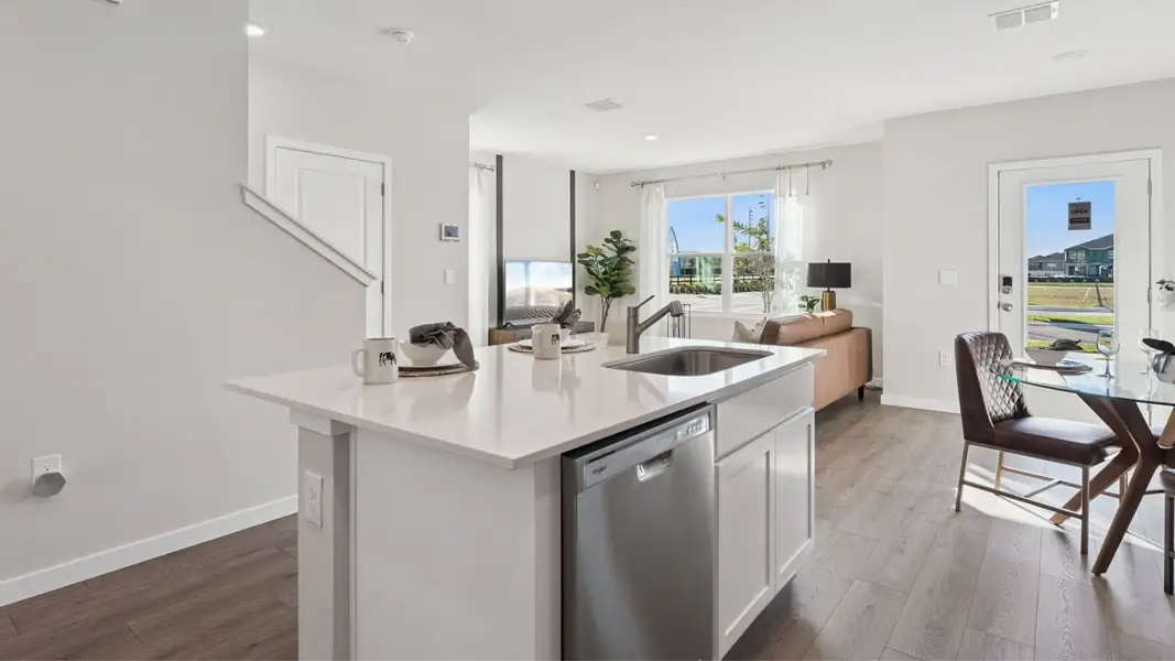 Furnished interior in a model home at Fish Lake Cove in Kissimmee (Image 9).