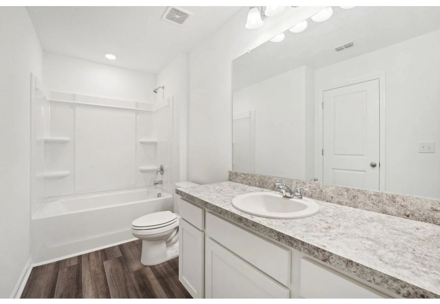 Furnished interior in a model home at Aster Towns in Summerville (Image 8).