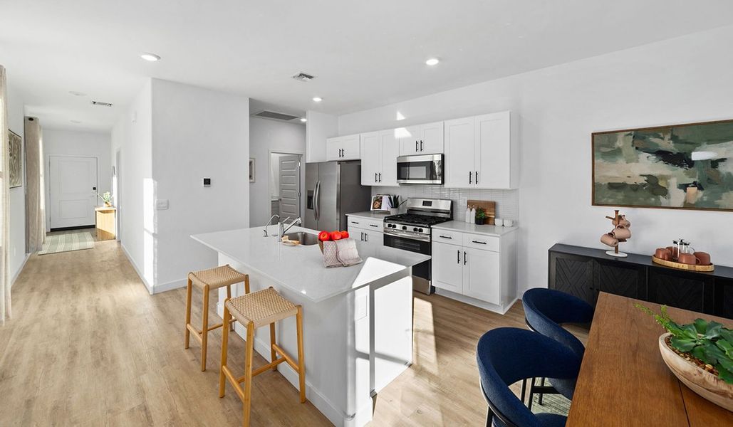 Furnished interior in a model home at Entrada Del Toro at Rancho Sahuarita in Sahuarita (Image 9).