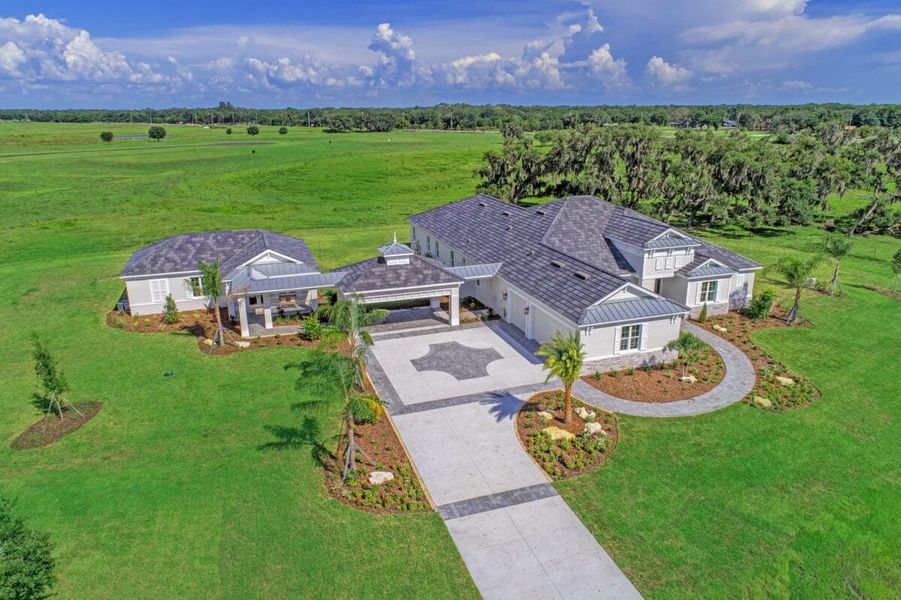 Front exterior of a home in the Hampton Lakes community, located in Sarasota, FL (Image 58).
