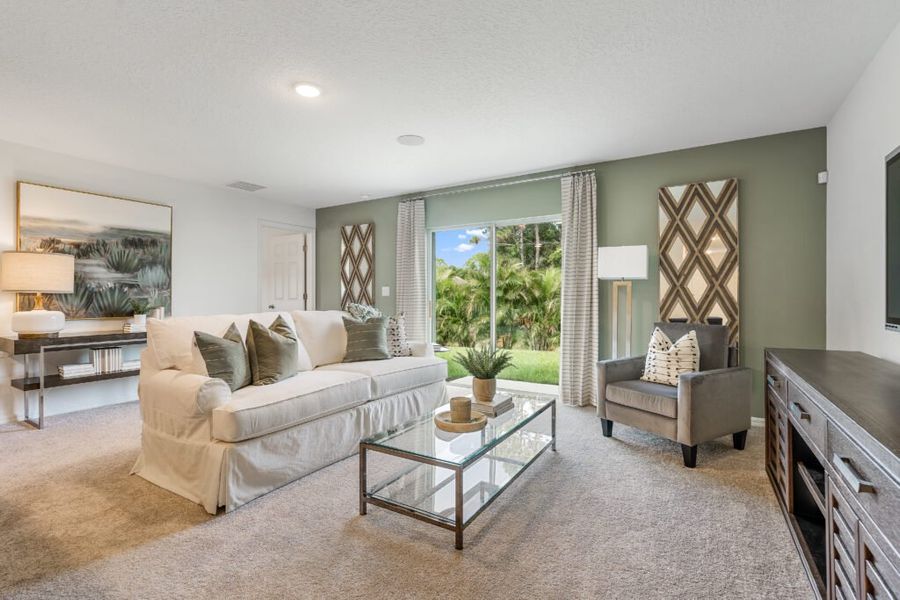 Furnished interior in a model home at Poinciana in Poinciana (Image 5).