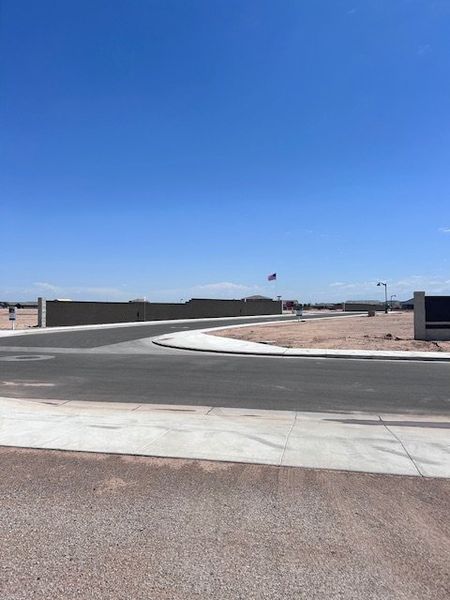 A developing neighborhood in Estates at Rancho Mirage by K. Hovnanian® Homes, showcasing open lots in Maricopa, AZ. A developing neighborhood in Estates at Rancho Mirage by K. Hovnanian® Homes, showcasing open lots in Maricopa, AZ.