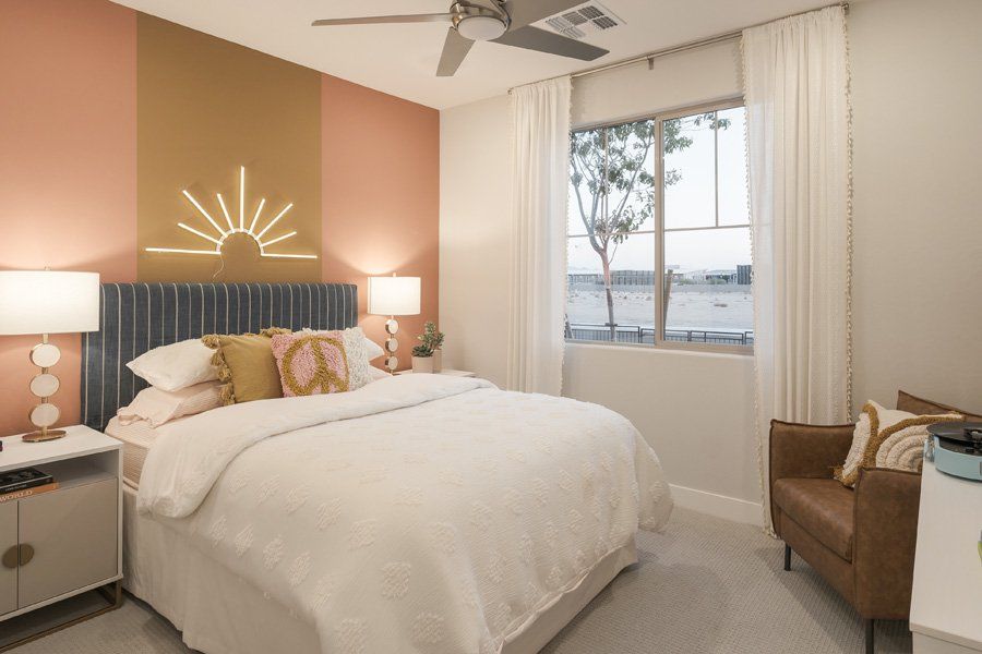 Furnished interior in a model home at Windrose V in Waddell (Image 36).