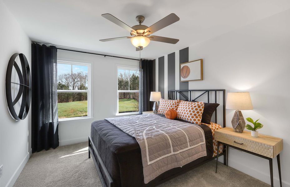 Secondary bedroom with natural lighting in Carraige Estates new construction homes Secondary bedroom with natural lighting in Carraige Estates new construction homes