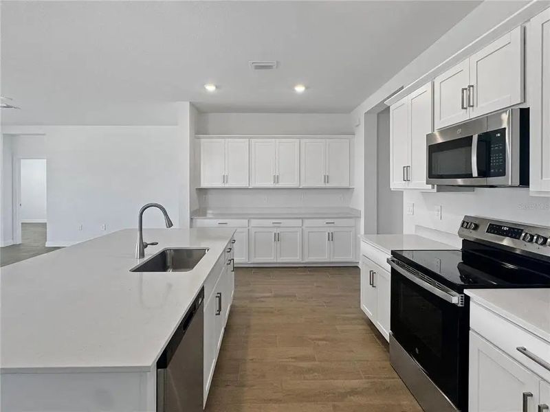 Furnished interior in a model home at Harbor East: Executive Homes in Port Charlotte (Image 7).