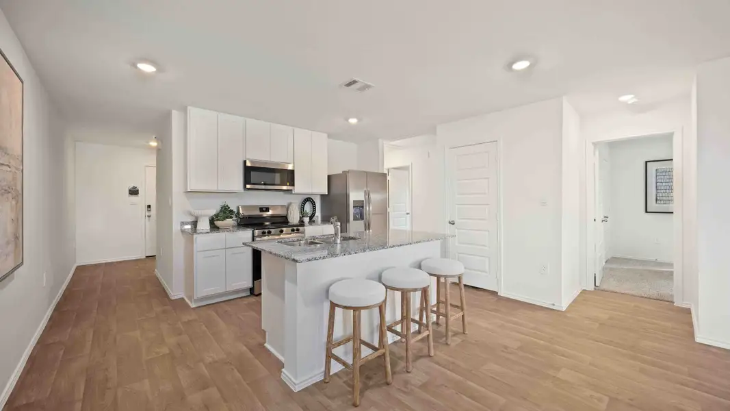 Furnished interior in a model home at Garver Heights in Houston (Image 5).