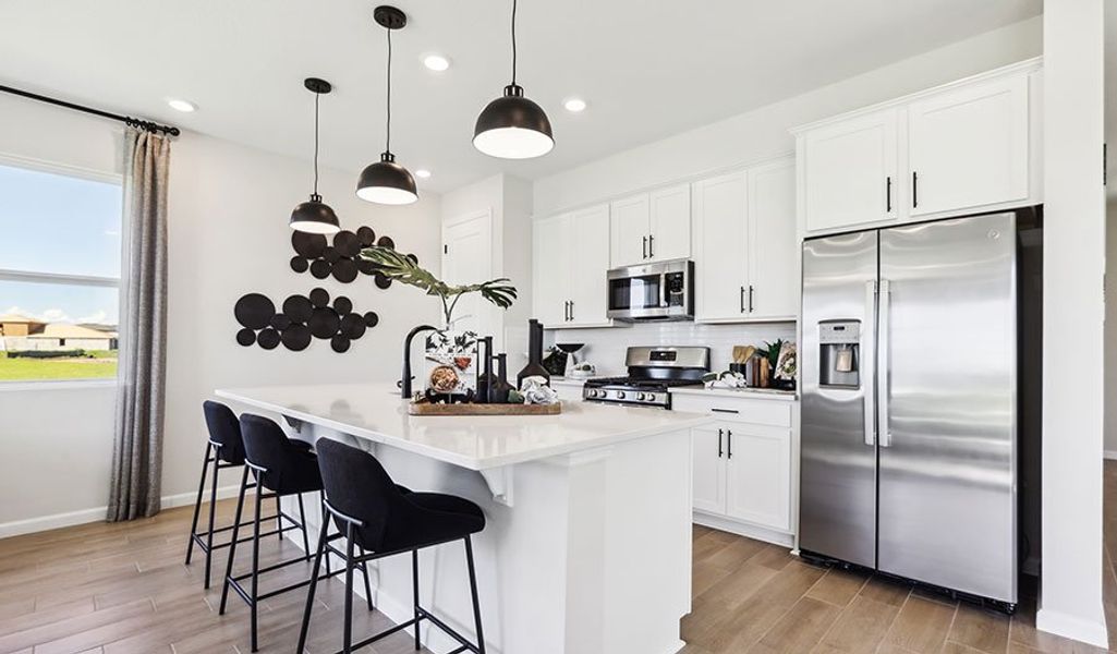 Furnished interior in a model home at Pine Grove Reserve in St. Cloud (Image 20).