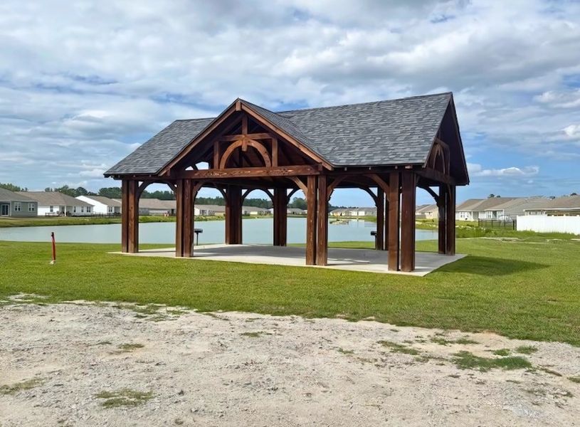 A gazebo in a grassy area. A gazebo in a grassy area.