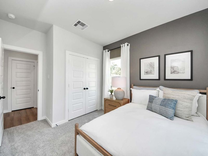 Furnished interior in a model home at Enclave at Newport in Crosby (Image 10).