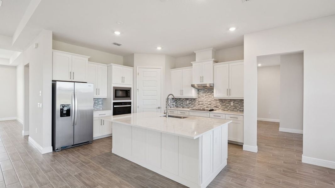 Furnished interior in a model home at Buena Lago in St. Cloud (Image 4).