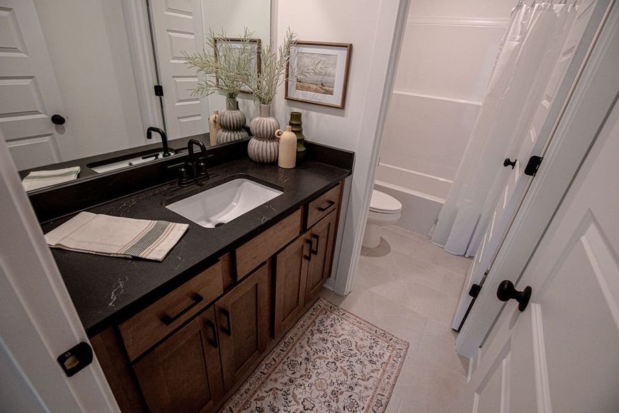 Furnished interior in a model home at The Townhomes at Union Depot in Bartlett (Image 28).