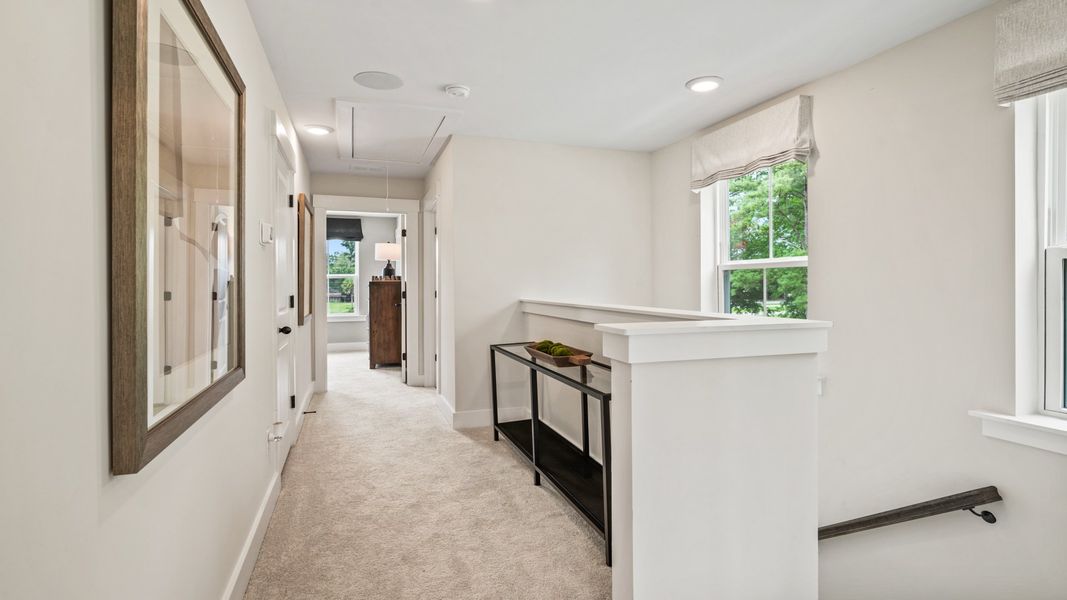 Furnished interior in a model home at Clear Springs Townhomes in North Charleston (Image 19).