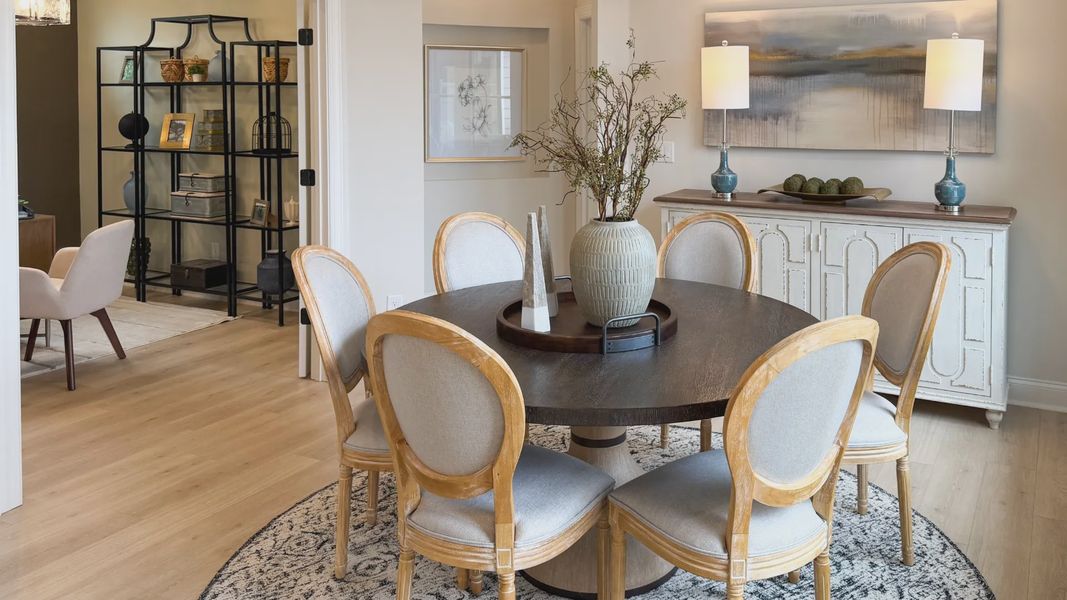 Furnished interior in a model home at The Courtyards at Hodges Farm in Charlotte (Image 32).