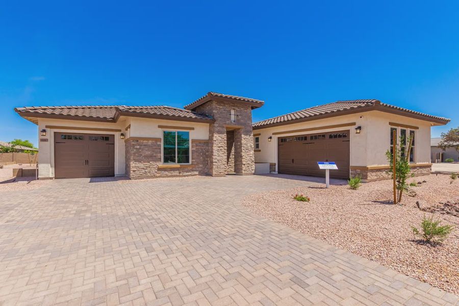 Front exterior of a home in the Bellero Estates community, located in Queen Creek, AZ (Image 12).