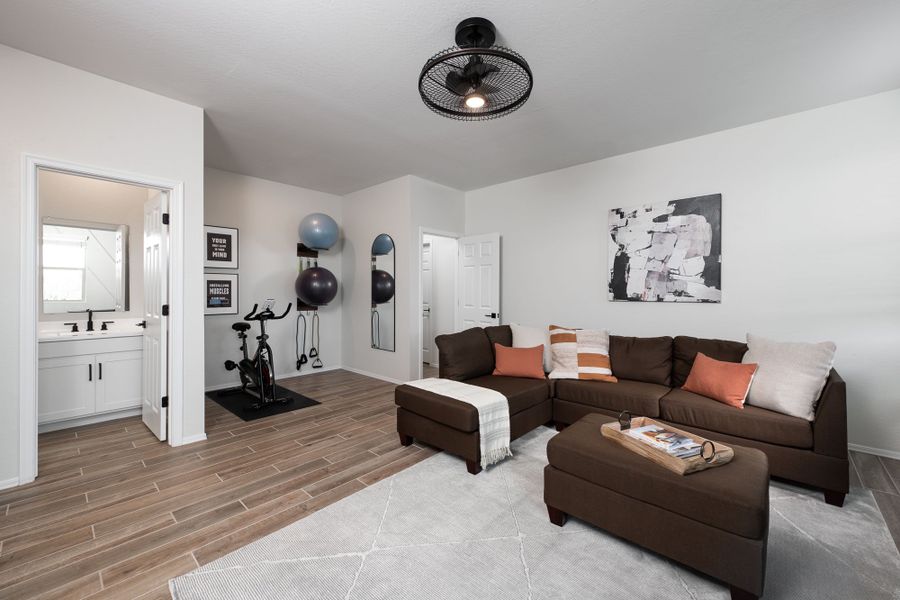 Furnished interior in a model home at Claro at Amarillo Creek in Maricopa (Image 9).