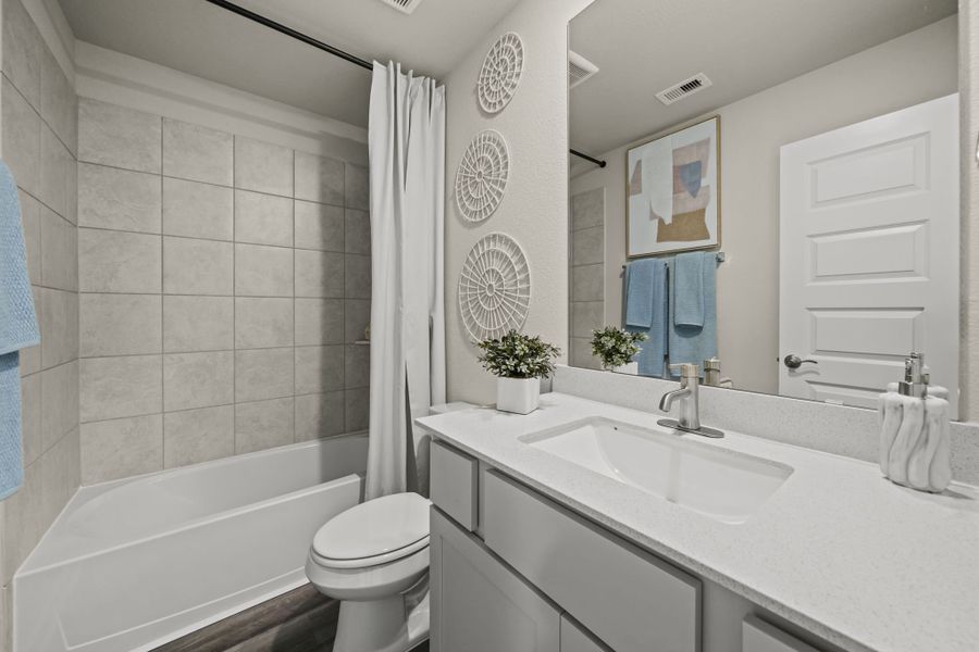 Furnished interior in a model home at Grand Magnolia in Magnolia (Image 25).