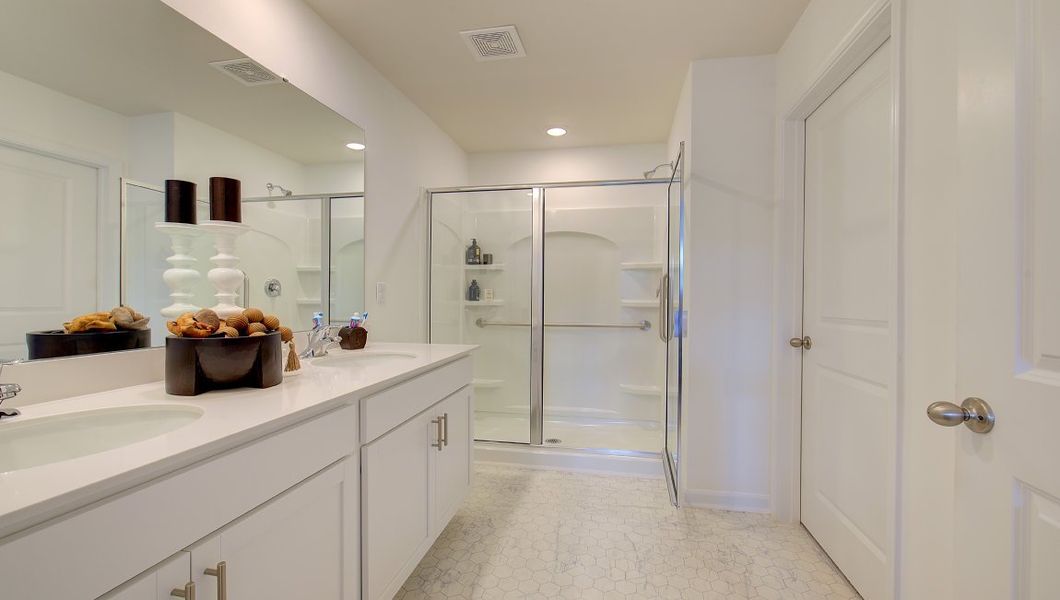 Furnished interior in a model home at Heritage Park in Fletcher (Image 27).