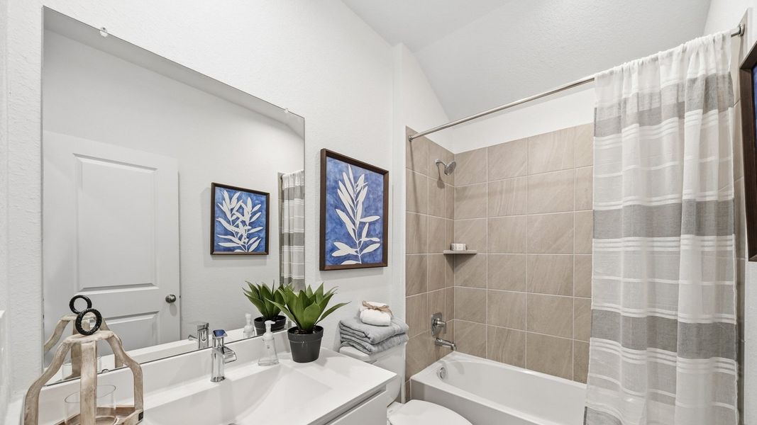 Furnished interior in a model home at Sunterra in Katy (Image 42).