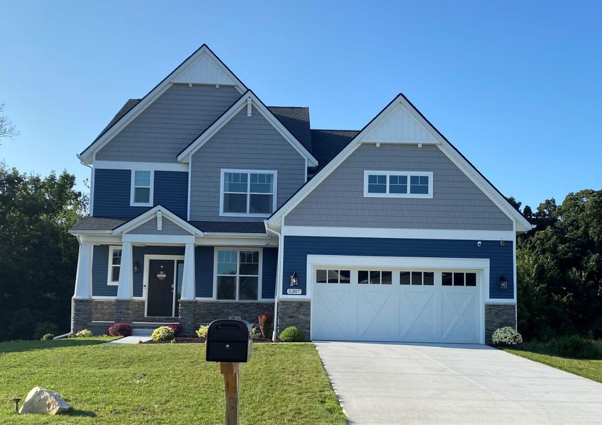 Front exterior of a home in the Mystic Ridge community, located in Whitmore Lake, MI (Image 5). Front exterior of a home in the Mystic Ridge community, located in Whitmore Lake, MI (Image 5).