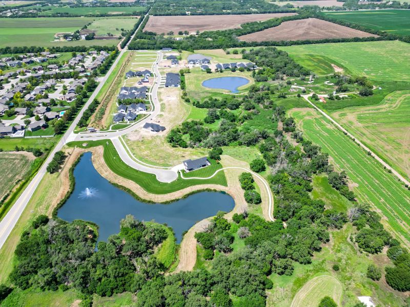 Aerial view of the The Courtyards at Jacobs Farm community in Wichita, KS, showing layout and nearby surroundings (Image 1). Aerial view of the The Courtyards at Jacobs Farm community in Wichita, KS, showing layout and nearby surroundings (Image 1).