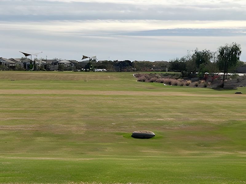 Expansive green landscape in Edgewood Estates by K. Hovnanian® Homes, Queen Creek, AZ, with scenic views and open space.
