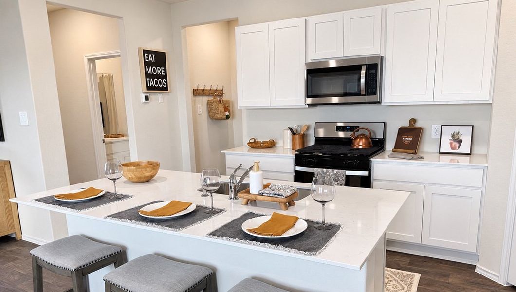 Furnished interior in a model home at Redbird Ranch in San Antonio (Image 38).