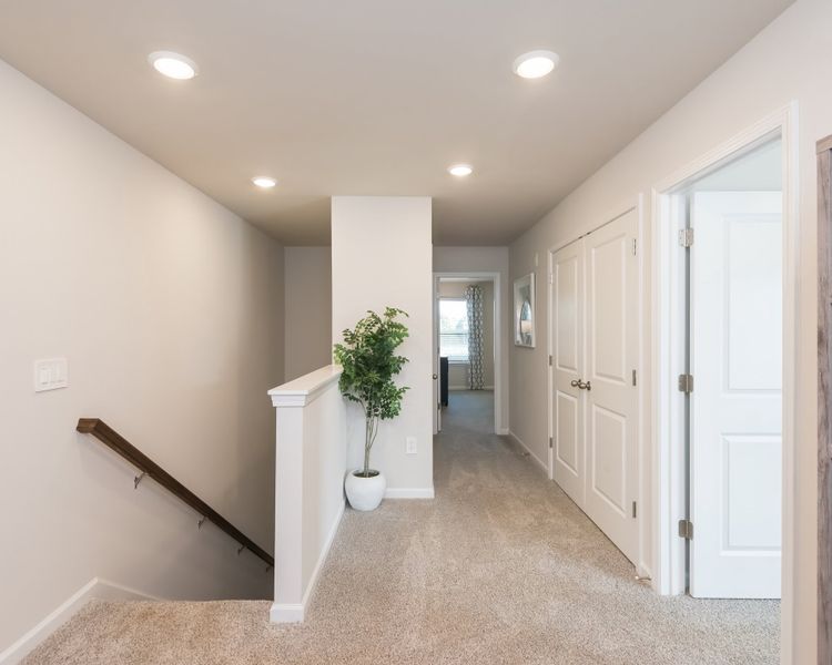 Spacious hallway with access to every room you need.