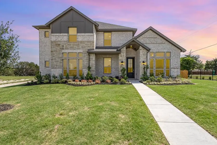 Front exterior of a home in the Ten Mile Creek Estates community, located in DeSoto, TX (Image 2). Front exterior of a home in the Ten Mile Creek Estates community, located in DeSoto, TX (Image 2).