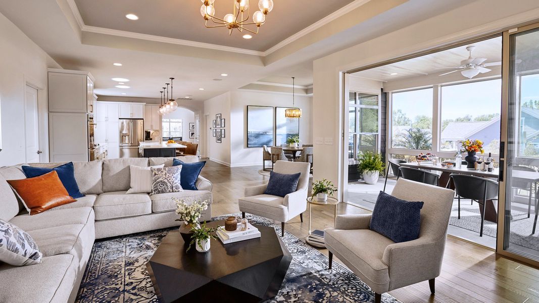 Furnished interior in a model home at The Courtyards at Wimberly in Apex (Image 3).
