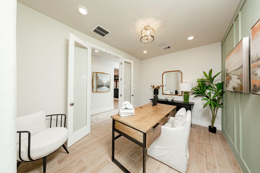 Furnished interior in a model home at Madeley Creek: Premier Collection in Conroe (Image 5).