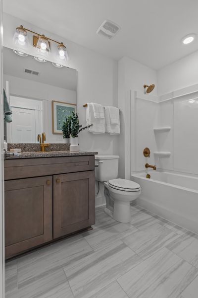 Furnished interior in a model home at Belmont at Albemarle in Hertford (Image 18).