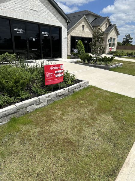 A charming brick home with landscaped frontage in Raburn Reserve 50s by Taylor Morrison, Tomball, TX. A charming brick home with landscaped frontage in Raburn Reserve 50s by Taylor Morrison, Tomball, TX.